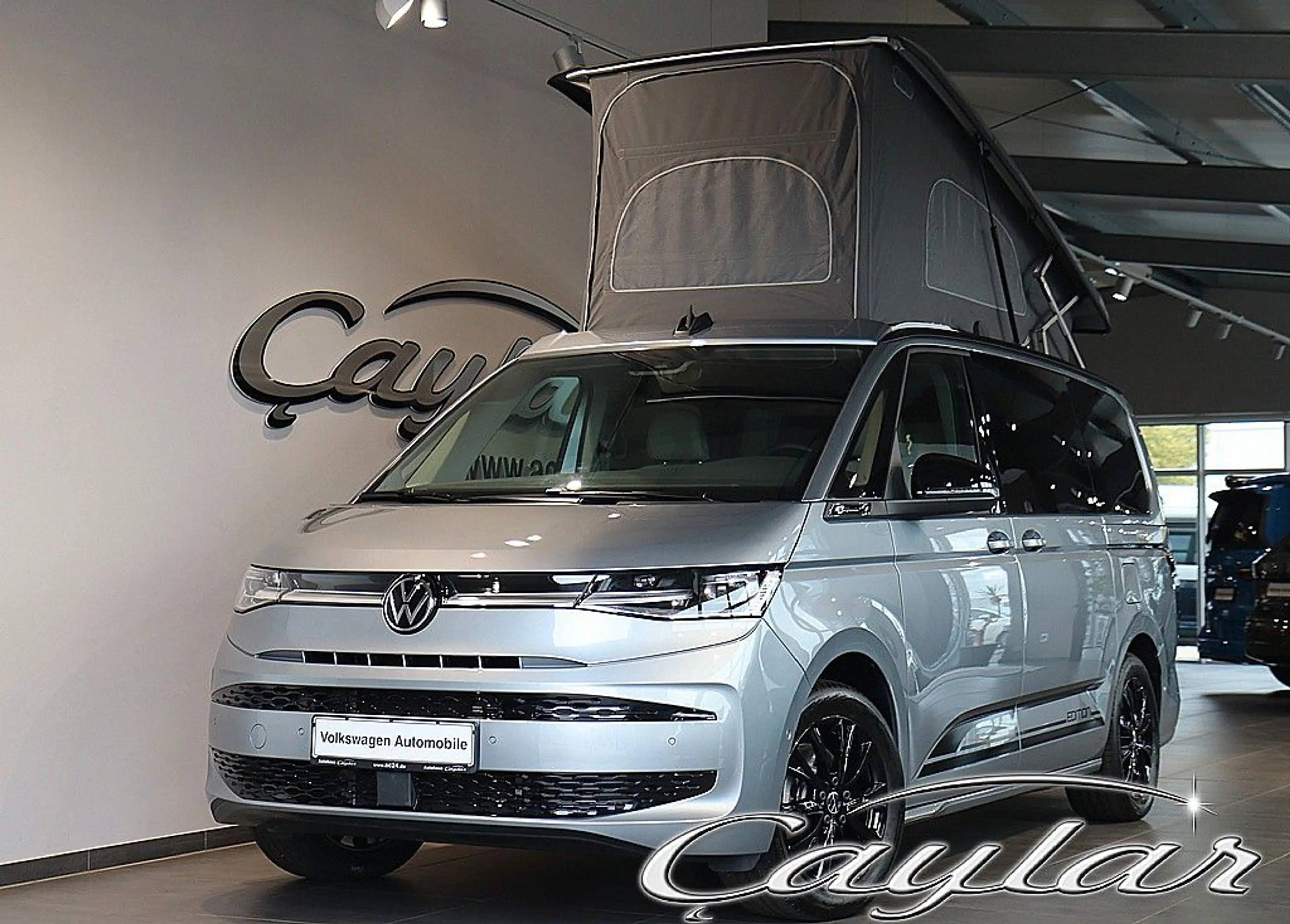 Volkswagen T7 California T7 CALIFORNIA BEACH HYBRID ALLRAD 5.SITZE TISCH