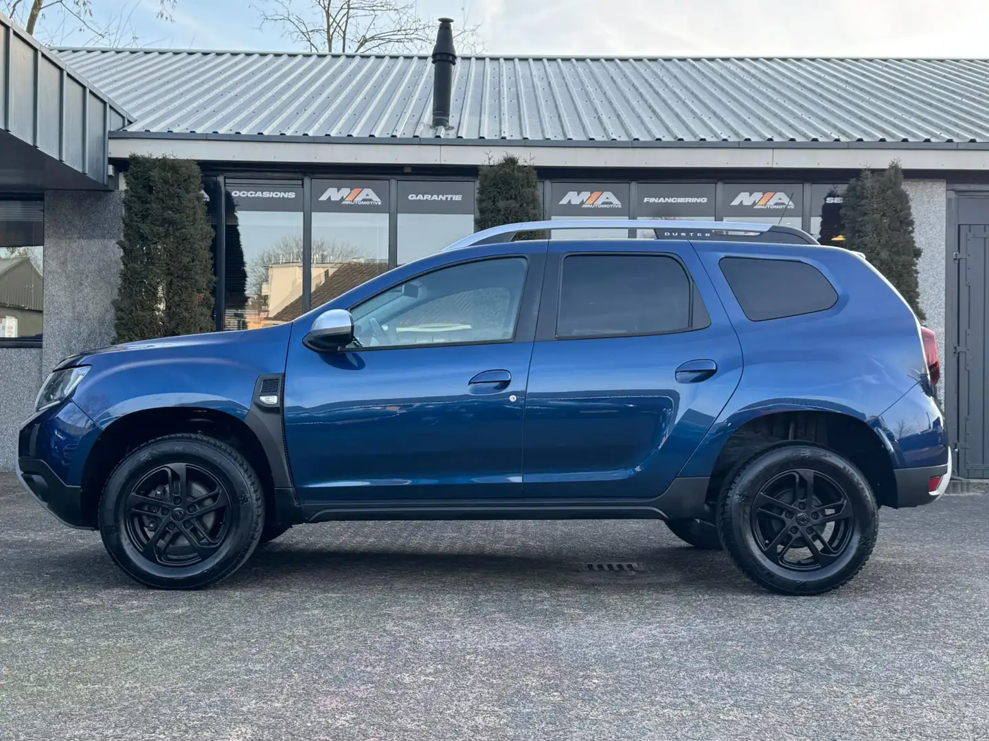 Dacia Duster 1.2 TCe Comfort | Cruise Control | Navi |1E EIG Blauw - 2