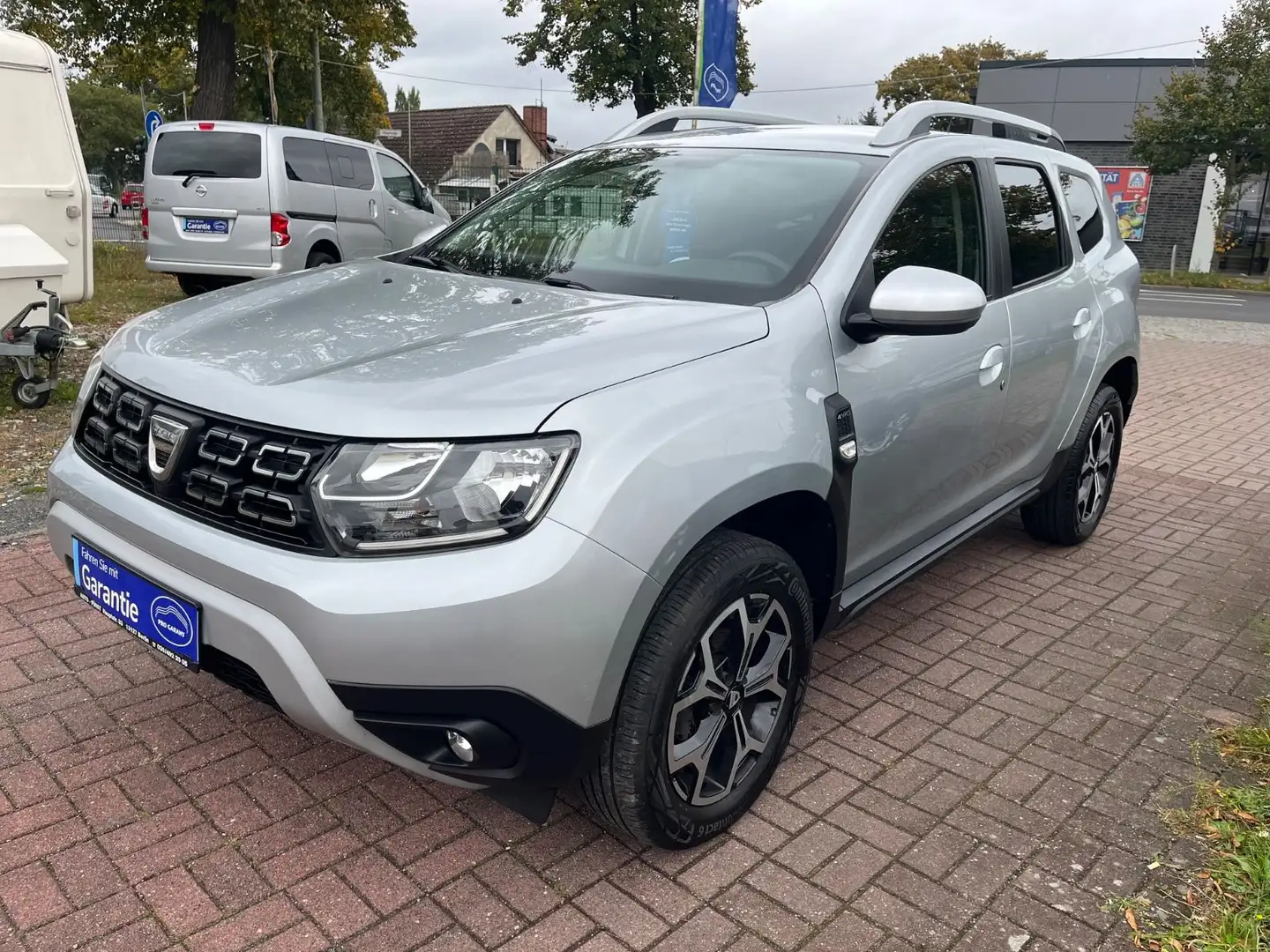 Dacia Duster II Prestige 4WD+KLIMA+NAVI+PDC+++ Silber - 1