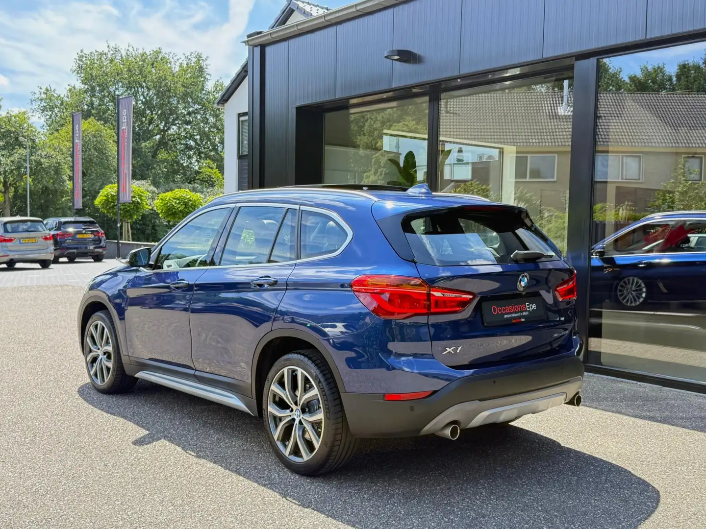 BMW X1 SDrive20i X-Line Headup Panoramadak Mediterranblau Blauw - 2