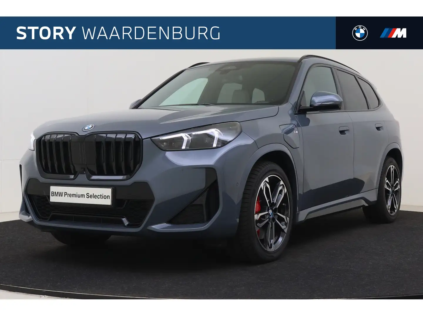 BMW X1 xDrive30e M Sport Automaat / Sportstoelen / Parkin Grigio - 1