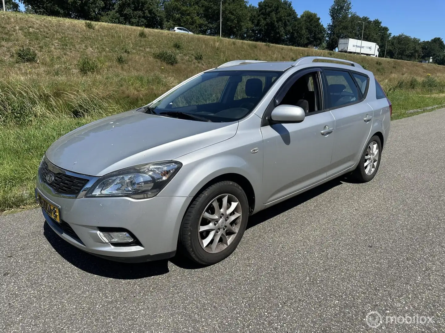 Kia Ceed / cee'd Sporty Wagon 1.4 CVVT X-ecutive lpg auto houd in Gris - 1