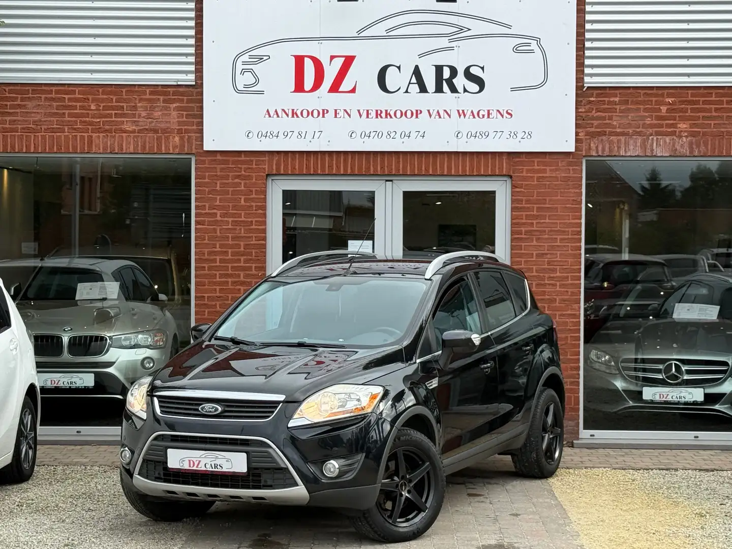Ford Kuga TITANIUM 2.0D 136PK |✅DIGITALE AIRCO | KEY LESS Zwart - 1
