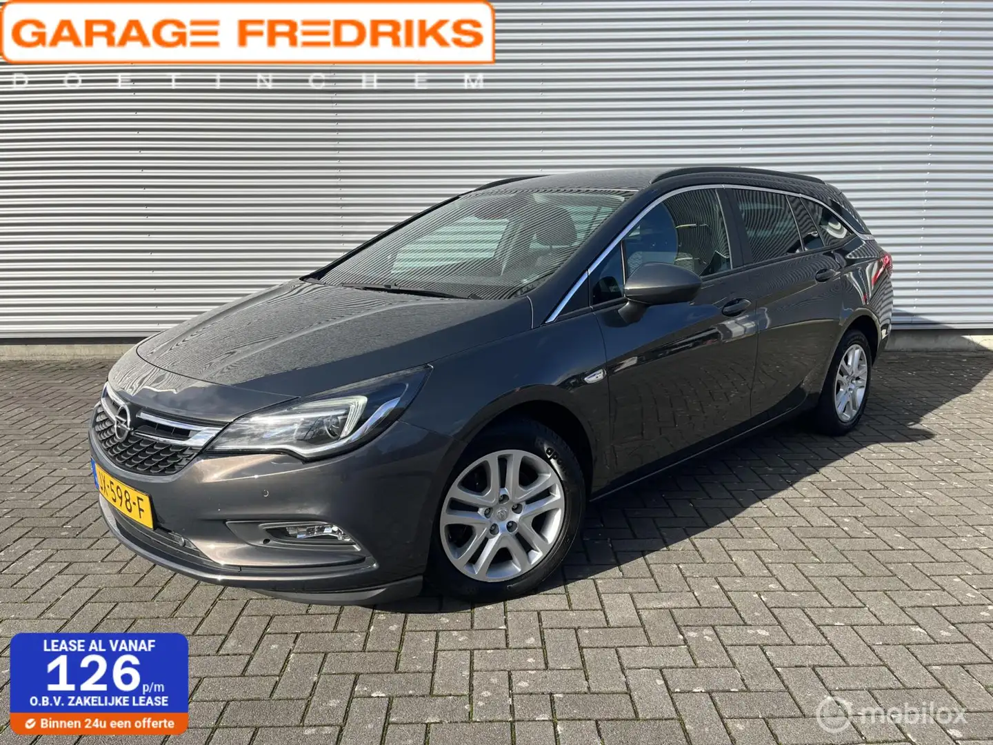 Opel Astra Sports Tourer 1.6 CDTI Business+ | Parkeersensoren Grijs - 1