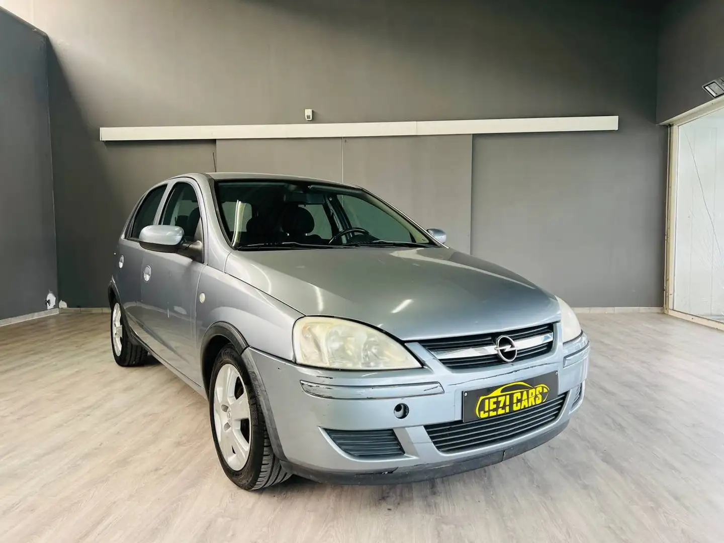 Opel Corsa Corsa1.0/ jaar garantie/Airco/GEKEURD VOOR VERKOOP Grijs - 1