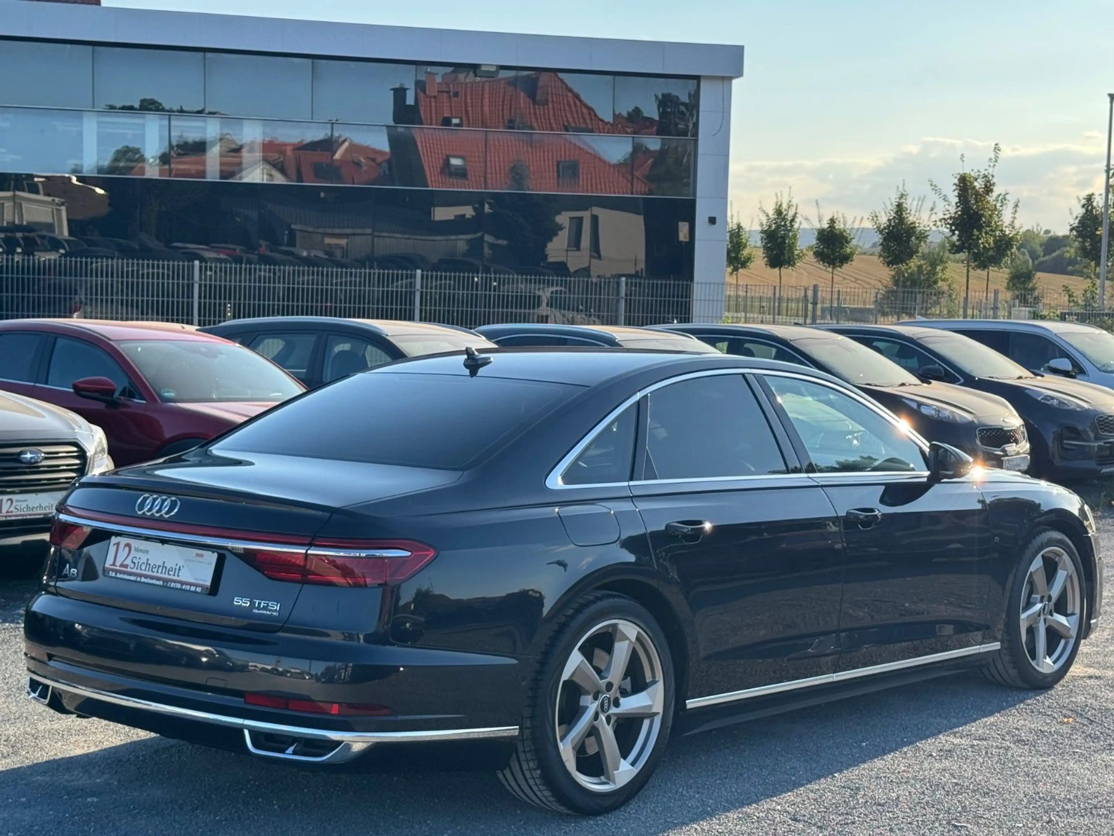 Audi A8 55 TFSI quattro — photo 6