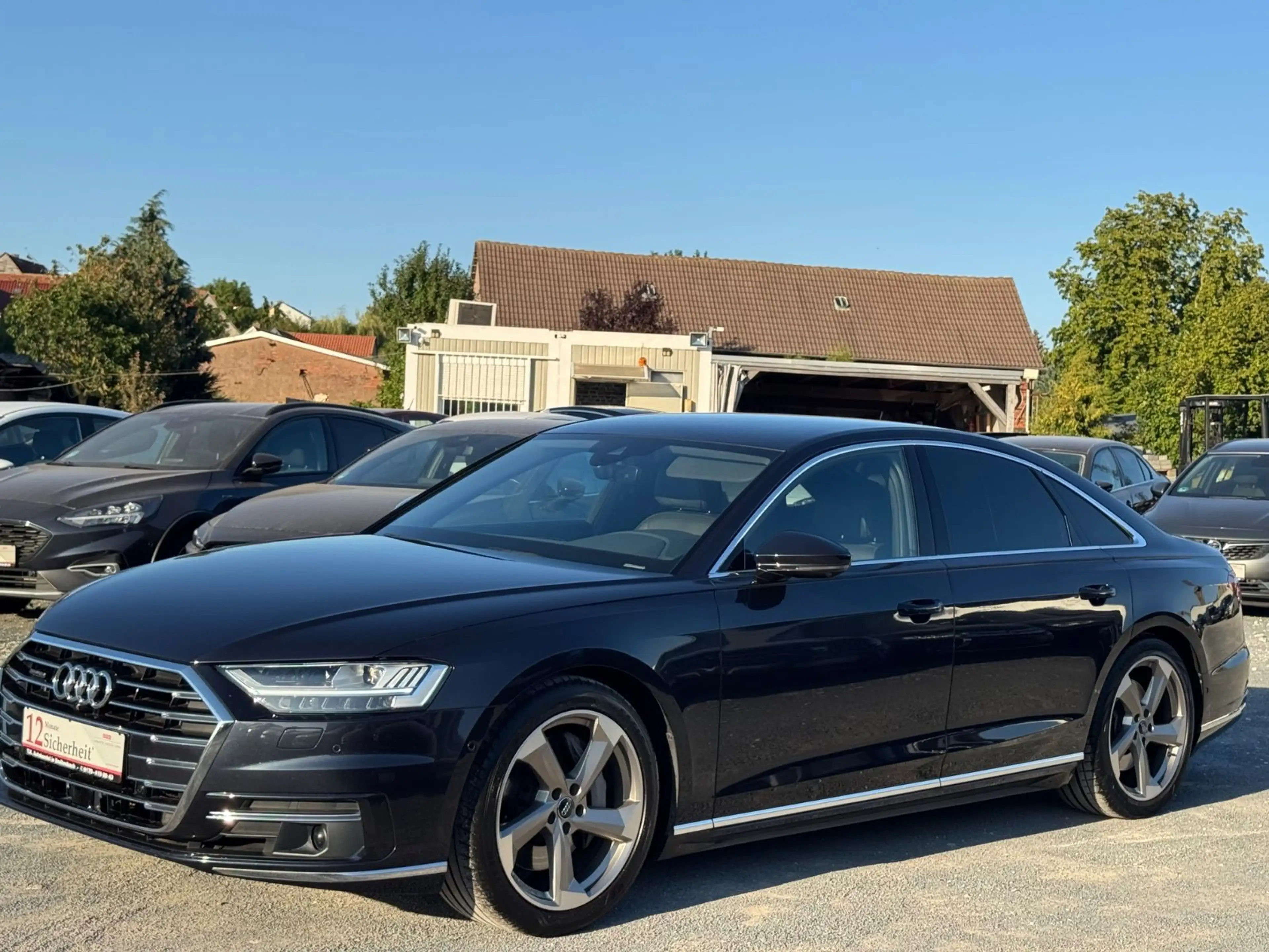 Audi A8 55 TFSI quattro — photo 4