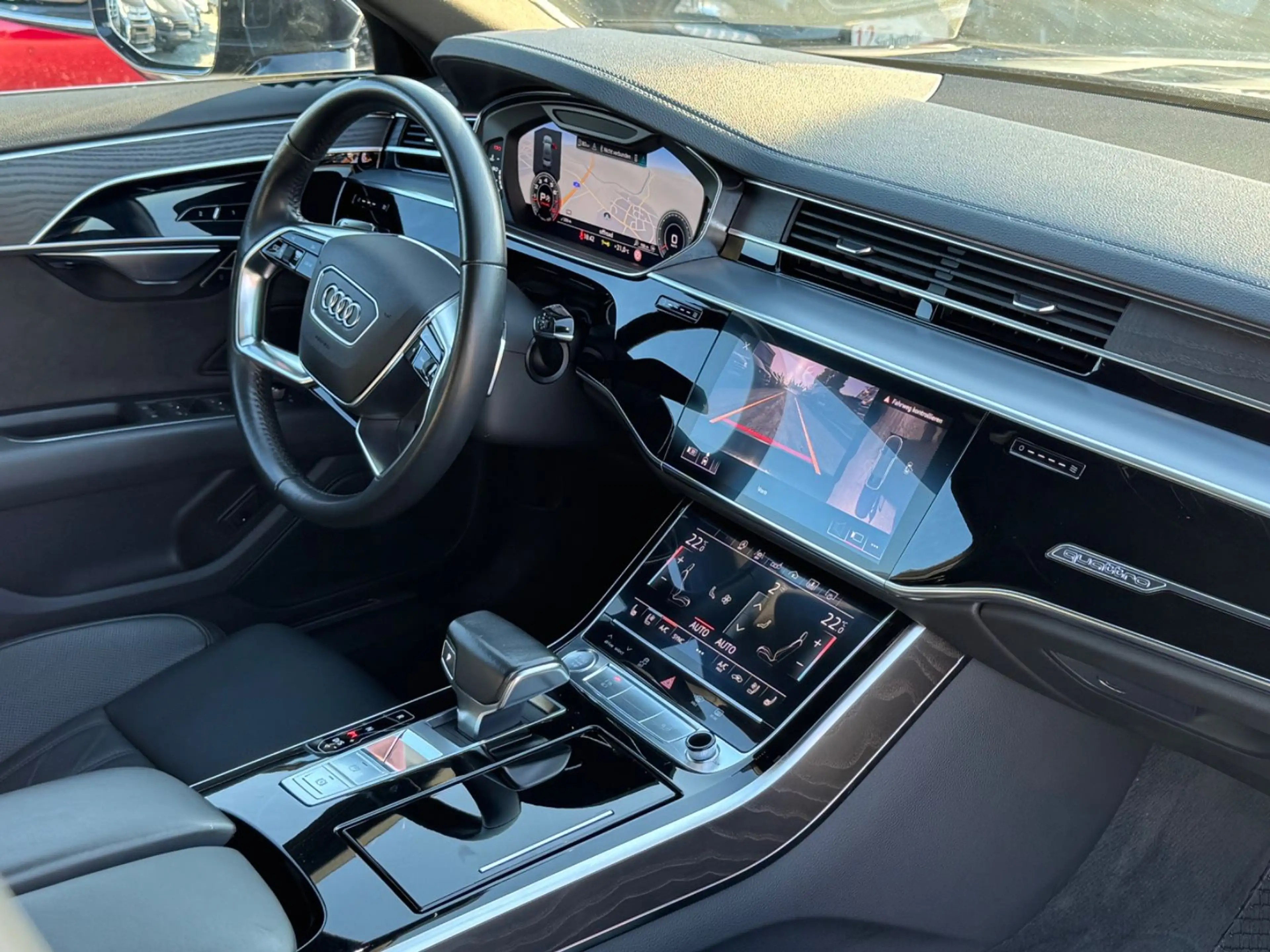 Audi A8 55 TFSI quattro — photo 14