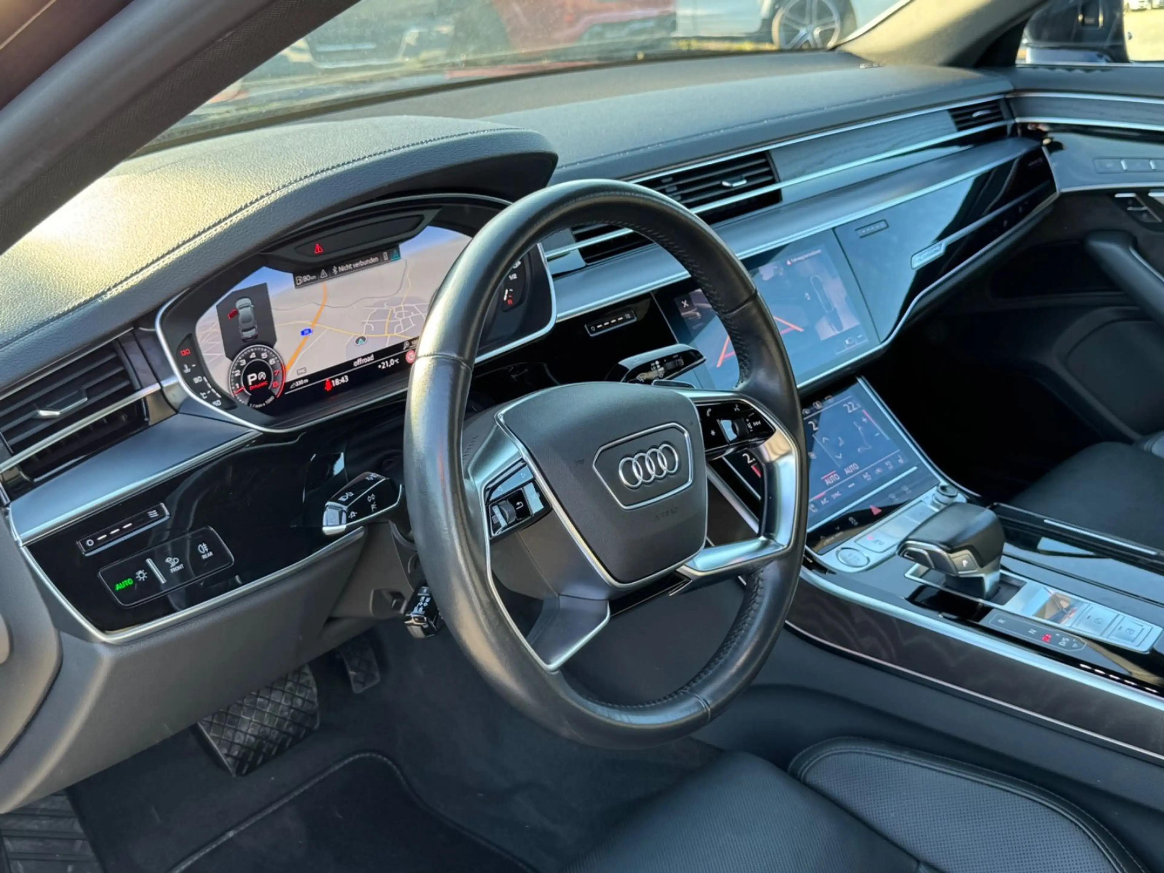 Audi A8 55 TFSI quattro — photo 13