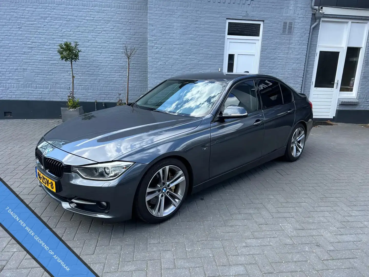 BMW 335 3-serie 335i | XENON | HARMAN KARDON | LEER | NAVI Grijs - 1