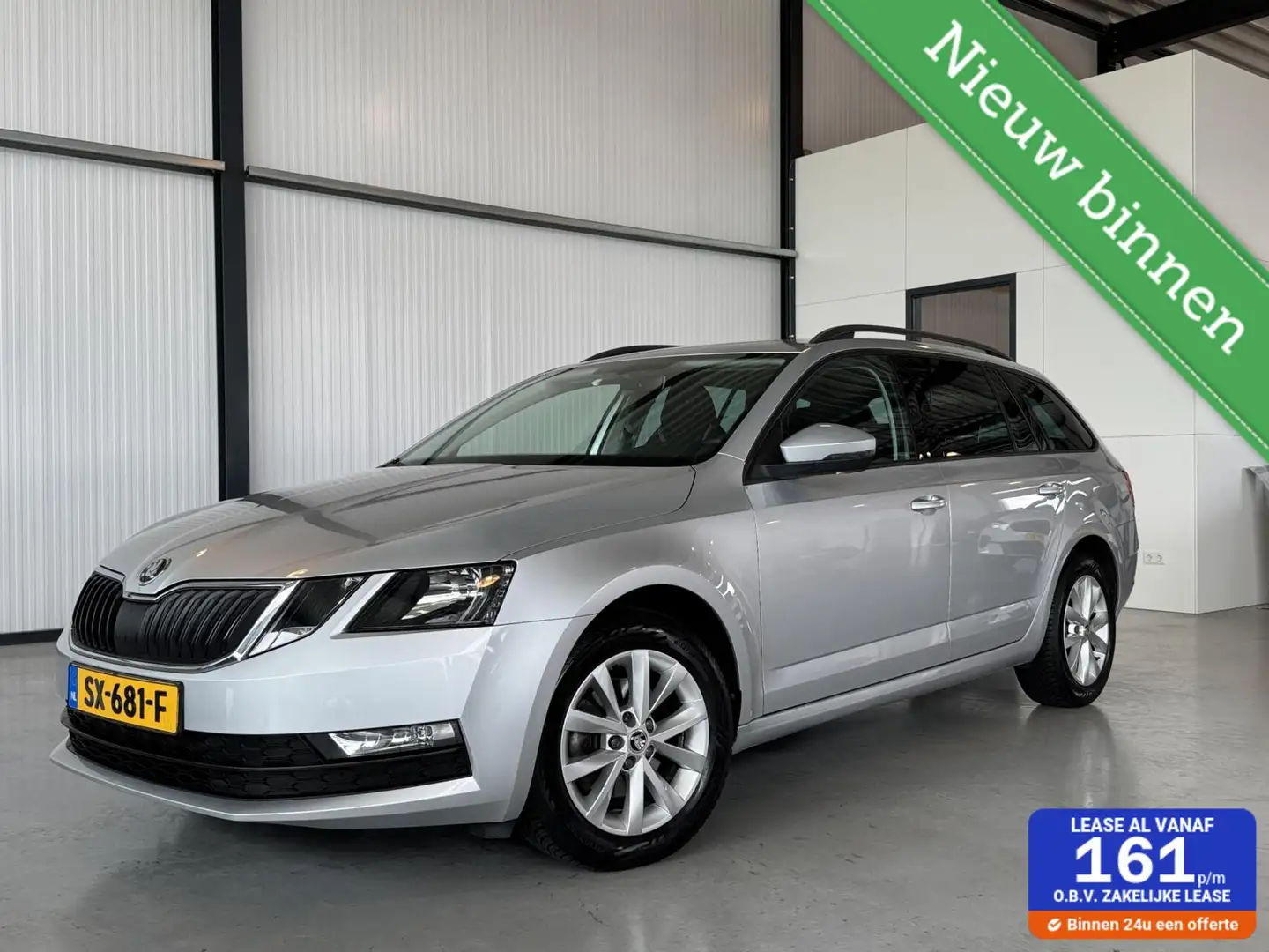 Skoda Octavia Combi 1.0 TSI Greentech Ambition Grijs - 1