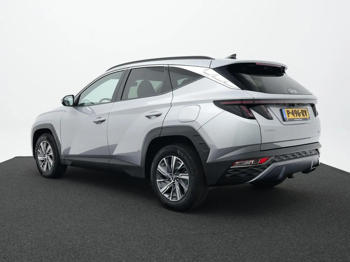 Hyundai TUCSON 1.6 T-GDI HEV Comfort Smart | Trekhaak | Cruise co Grau - 2