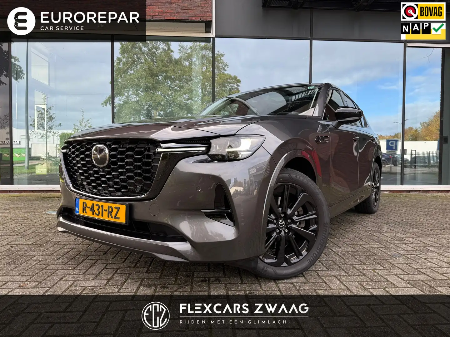Mazda CX-60 2.5 e-SkyActiv PHEV Homura - Automaat - Pano/schui Grijs - 1