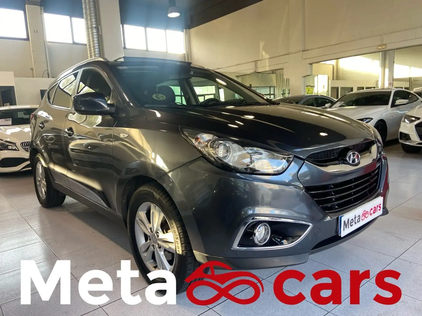 Hyundai iX35 1.7CRDI Comfort Sky 4x2 Grijs - 1