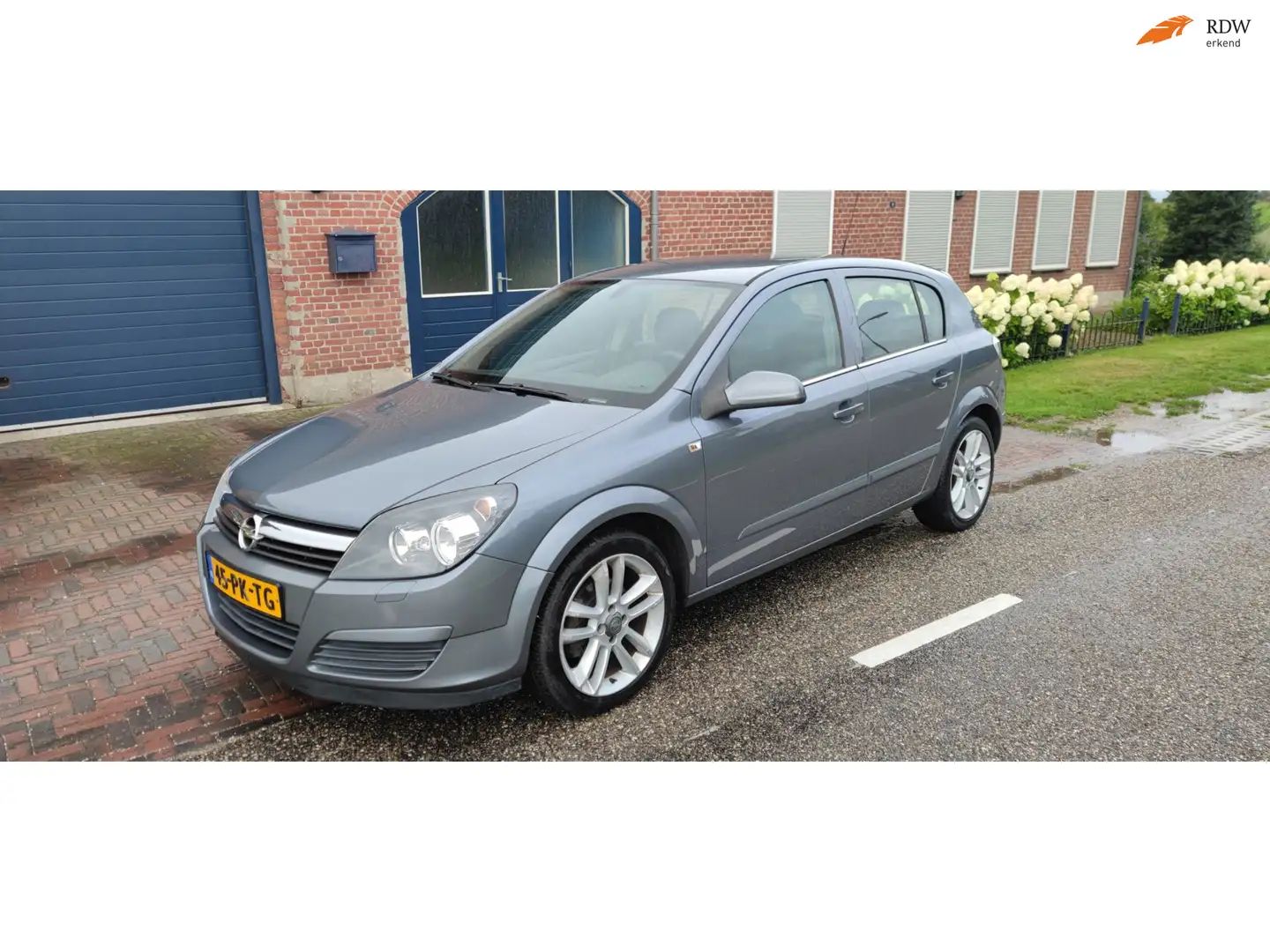 Opel Astra 1.6 Enjoy apk t/m 02-04-2027 Grau - 1