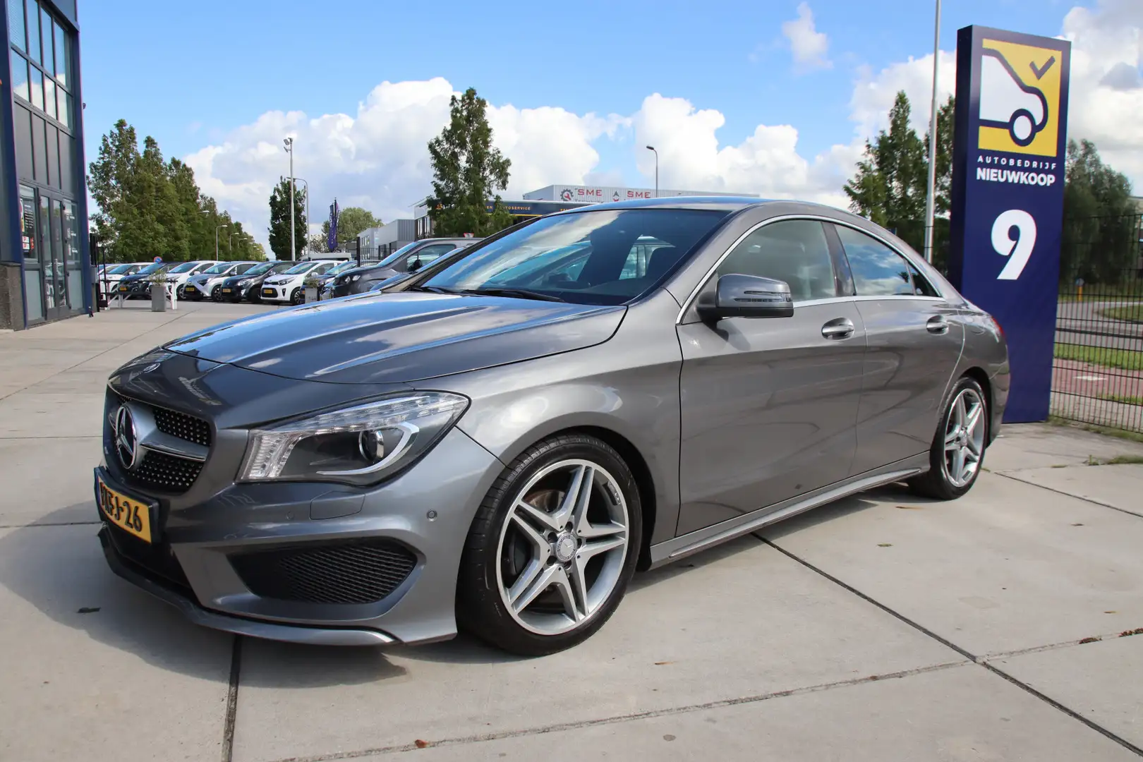 Mercedes-Benz CLA 200 AMG line DCT Navi, LED, PDC, NL auto, NAP Lente aa Grijs - 1