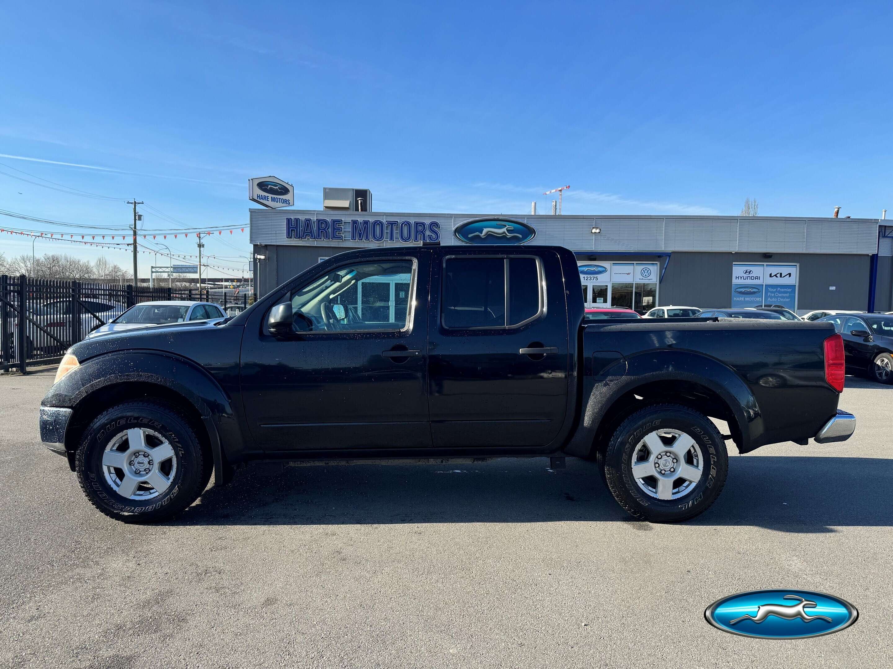 Black 2006 Nissan Frontier SE Crew Cab 4WD SB with manual Pickup Truck Four-Wheel Drive 5-Speed Automatic