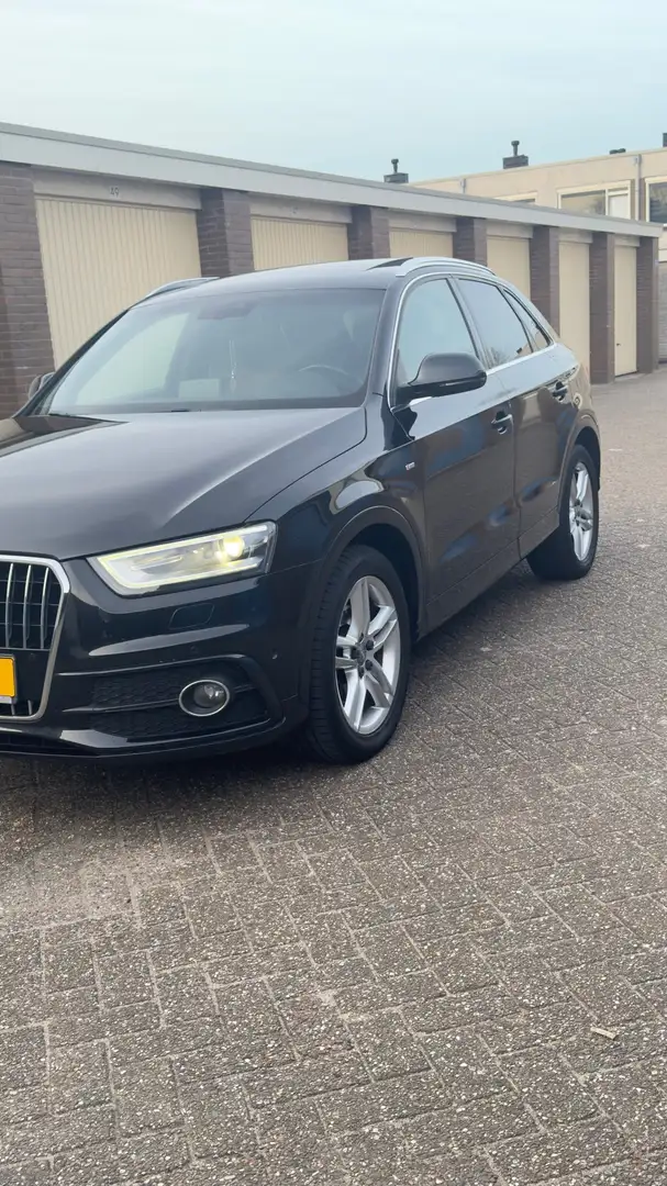 Audi Q3 2.0 TFSI q. S Edit. Zwart - 1