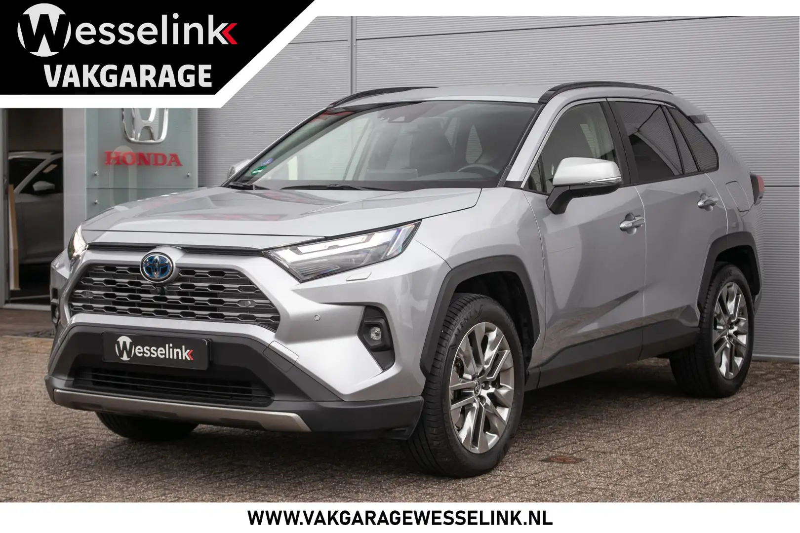 Toyota RAV 4 2.5 Hybrid AWD Executive Premium Dealerond. | Trek Grijs - 1