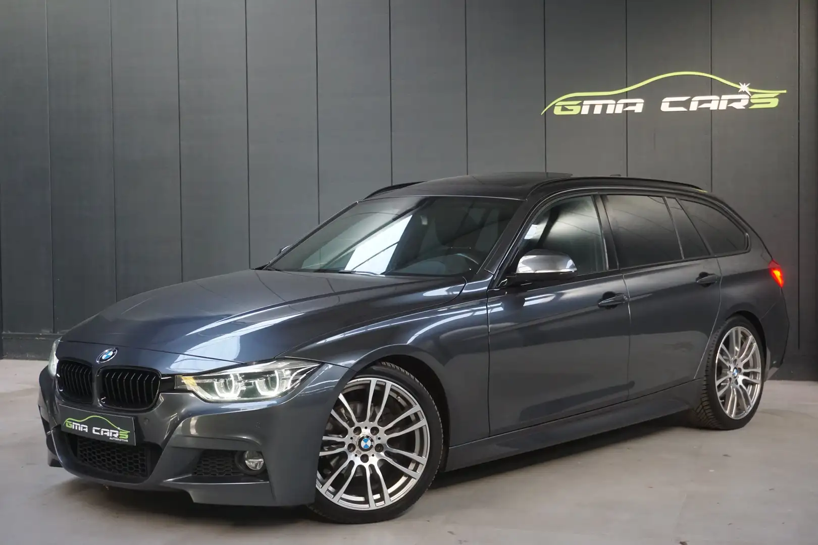BMW 320 i Tour. Aut. M Sport -Navi-Leder-PDC-Pano-Garantie Grijs - 1