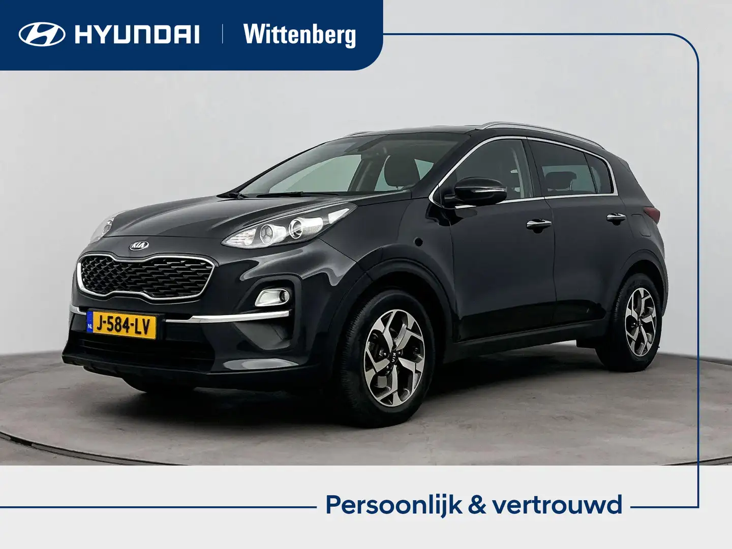 Kia Sportage 1.6 T-GDI DynamicLine Aut. | Lage km-stand! | Navi Zwart - 1