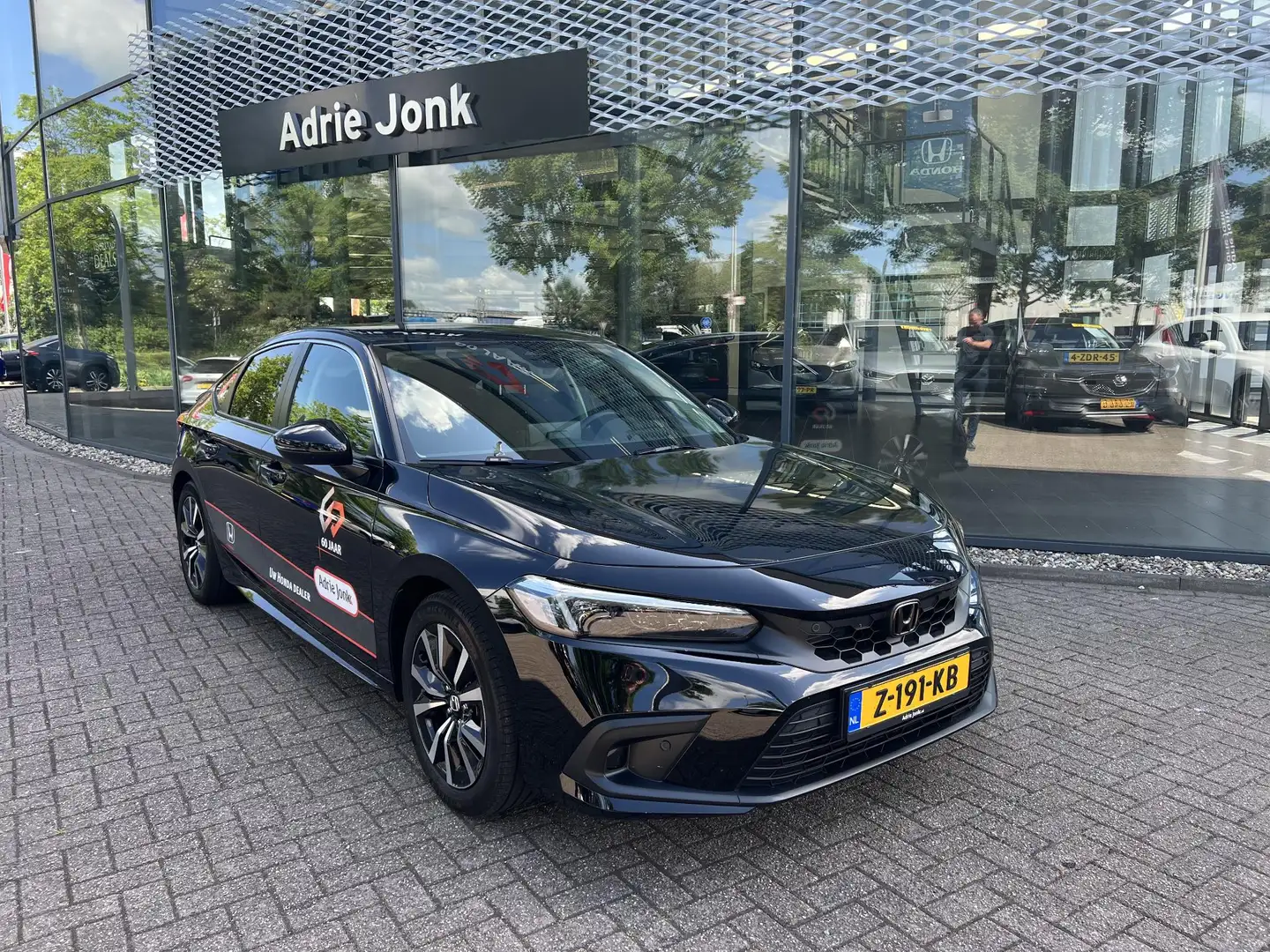 Honda Civic 2.0 e:HEV Elegance | AUTOMAAT | SPORTPAKKET |  APP Zwart - 1