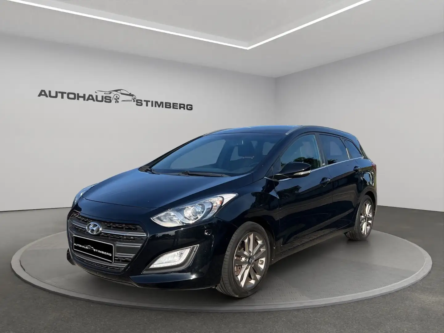 Hyundai i30 cw blue Passion*AHK*KAMERA*NAVI*PDC*1. HAND* Schwarz - 1
