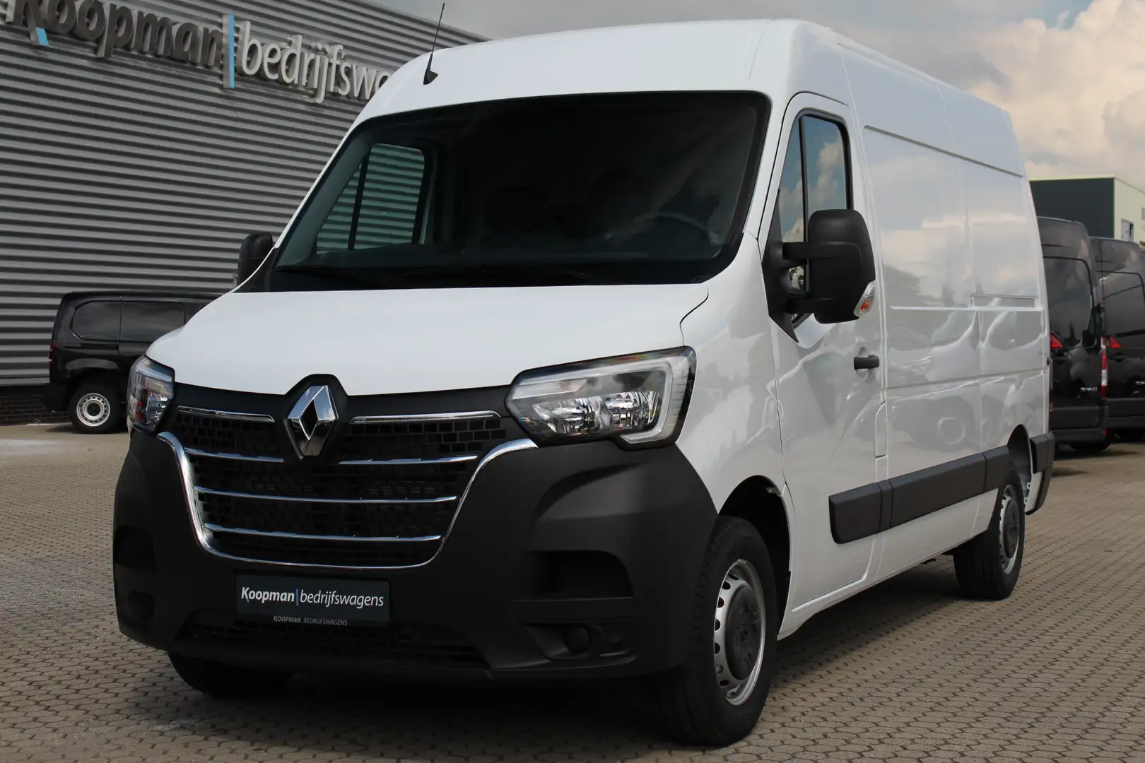 Renault Master T35 2.3dCi 150pk L2H2 | Airco | Cruise | Navi | DA Wit - 2