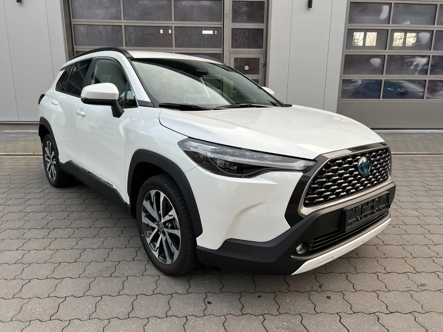 Toyota Corolla Cross 1.8 Hybrid Style Comfort *BSM* TOP Weiß - 1