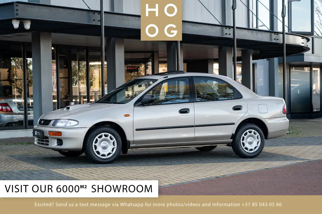 Mazda 323 1995 из Европы — купить под ключ