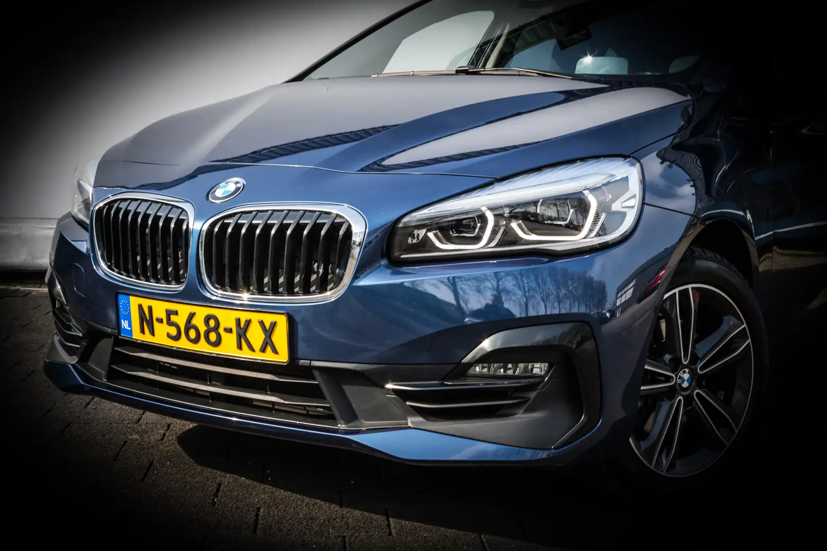 BMW 216 2-serie Gran Tourer 216i 7p. Business Edition Trek Blauw - 2