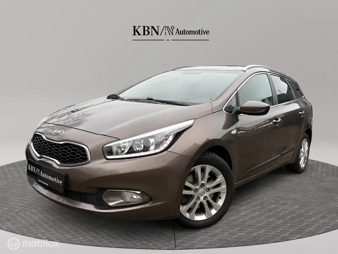 Kia Ceed SW / cee'd SW 1.4 CVVT | Stoelverw.| PDC | Airco | Sportswagon Bruin - 1