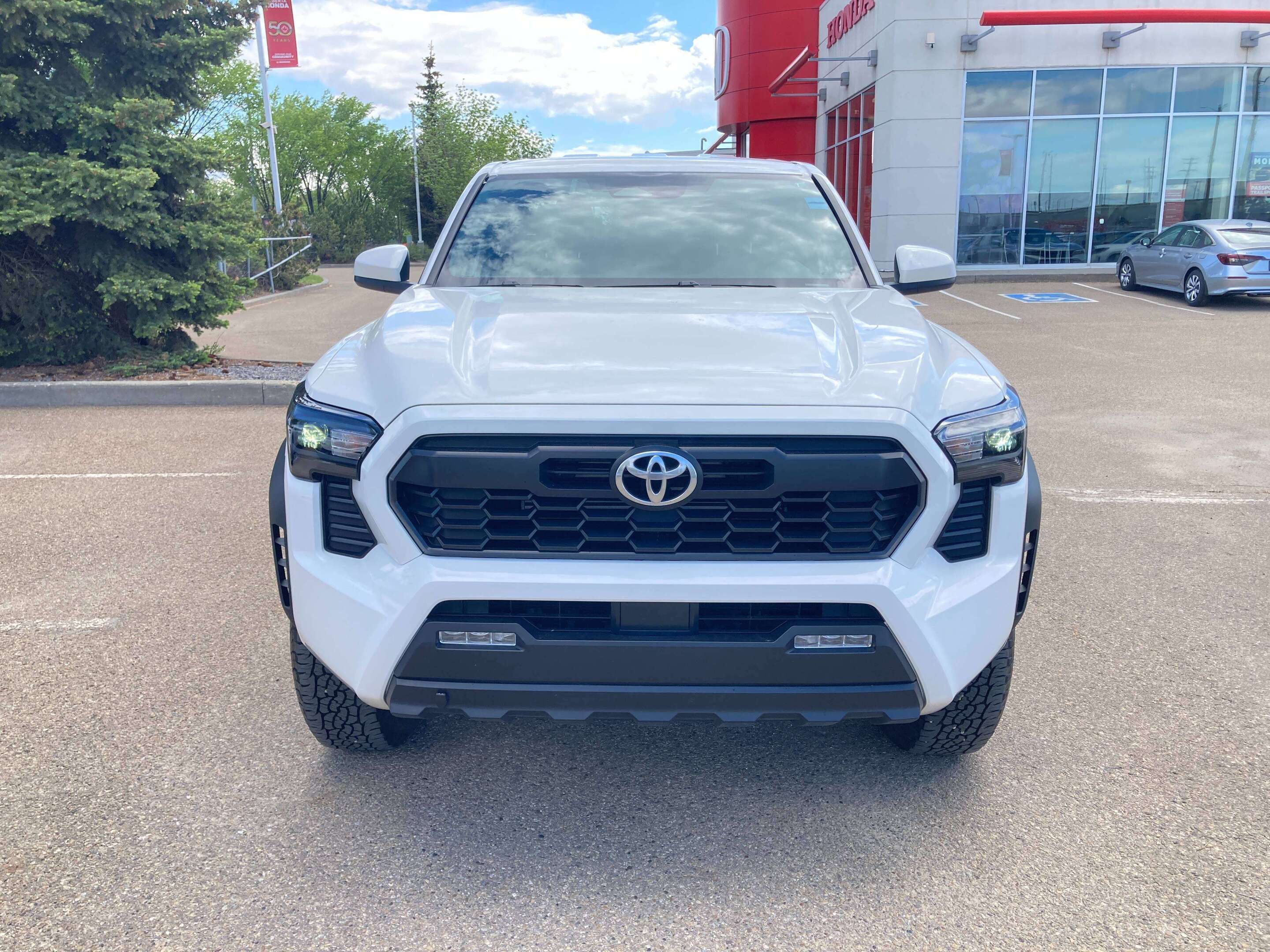 used 2024 Toyota Tacoma car, priced at $51,900