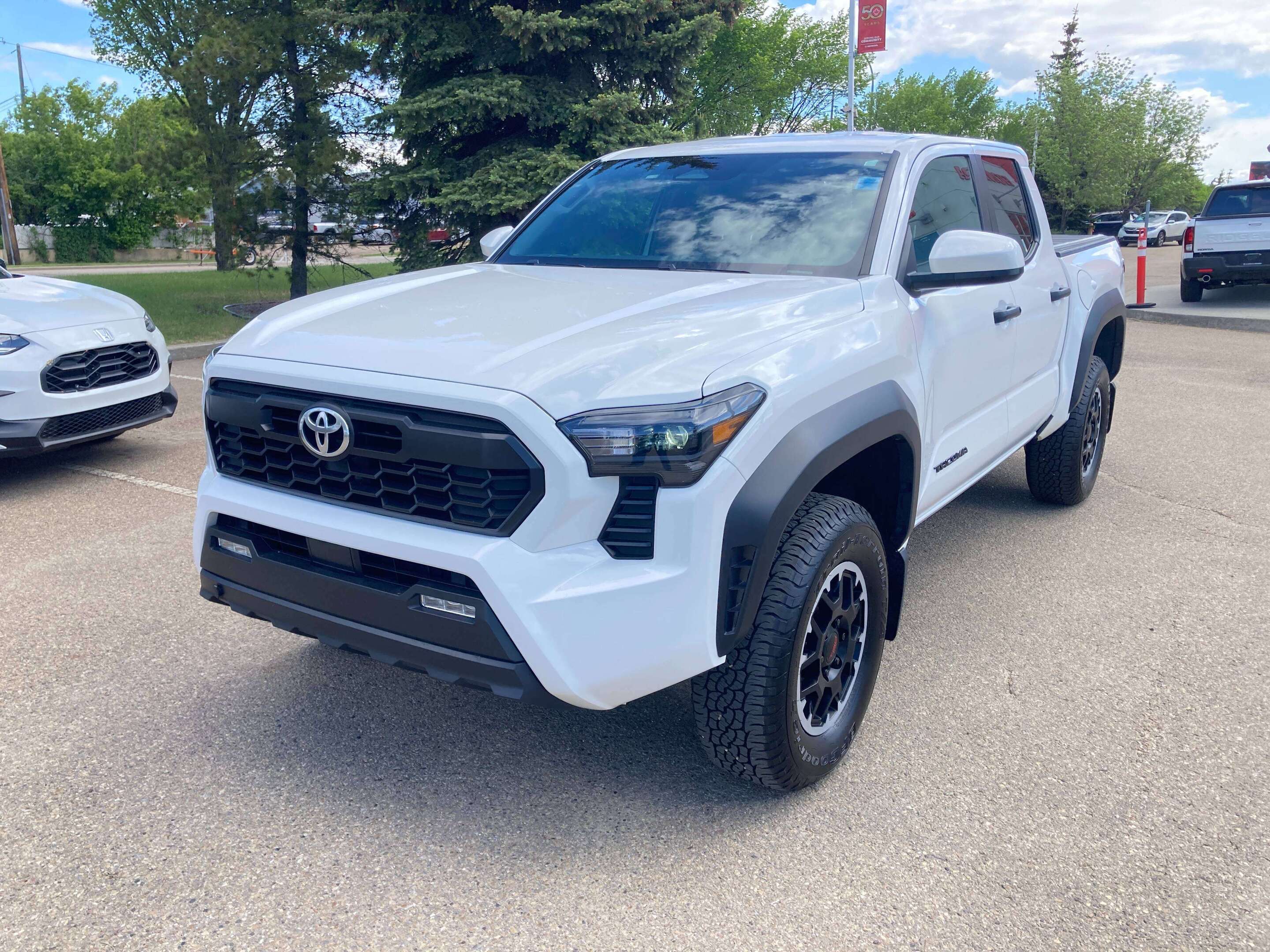 used 2024 Toyota Tacoma car, priced at $51,900