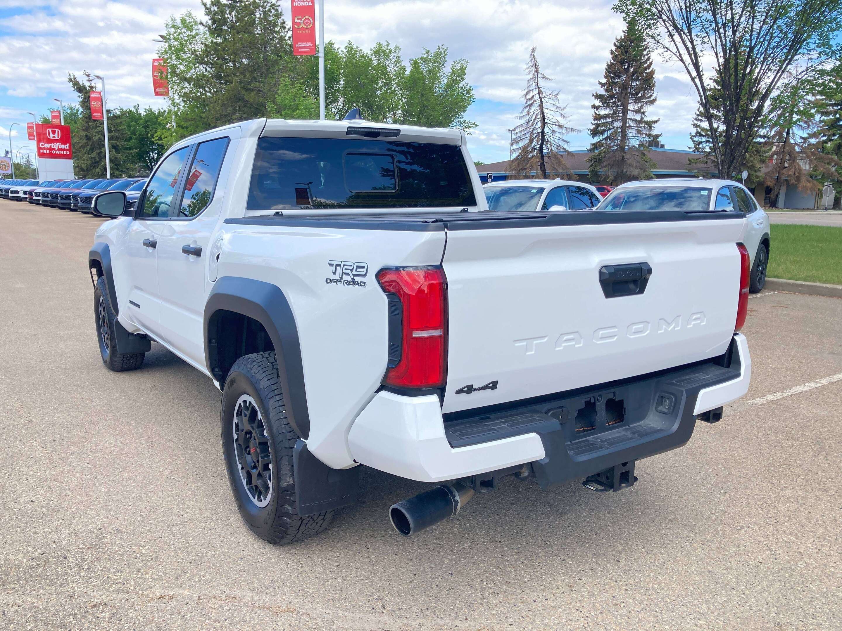 used 2024 Toyota Tacoma car, priced at $51,900