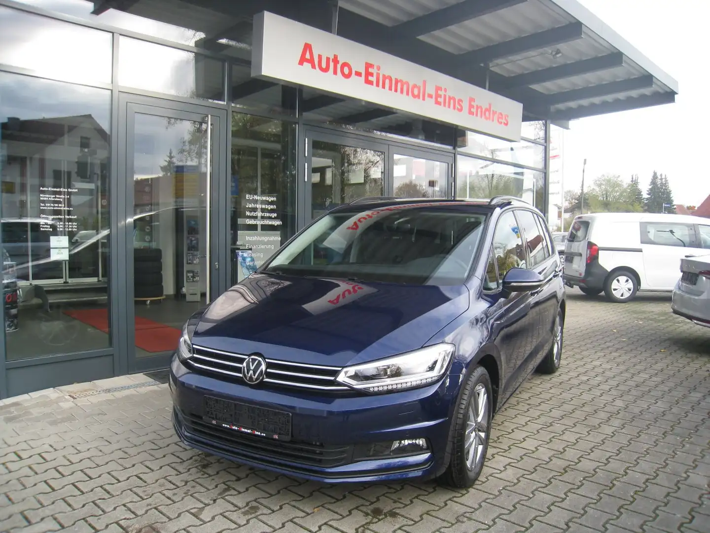 Volkswagen Touran 1.5TSI DSG COMFORT EDITION *7-Sitze*ACC*NAVI*el.HK Blau - 1