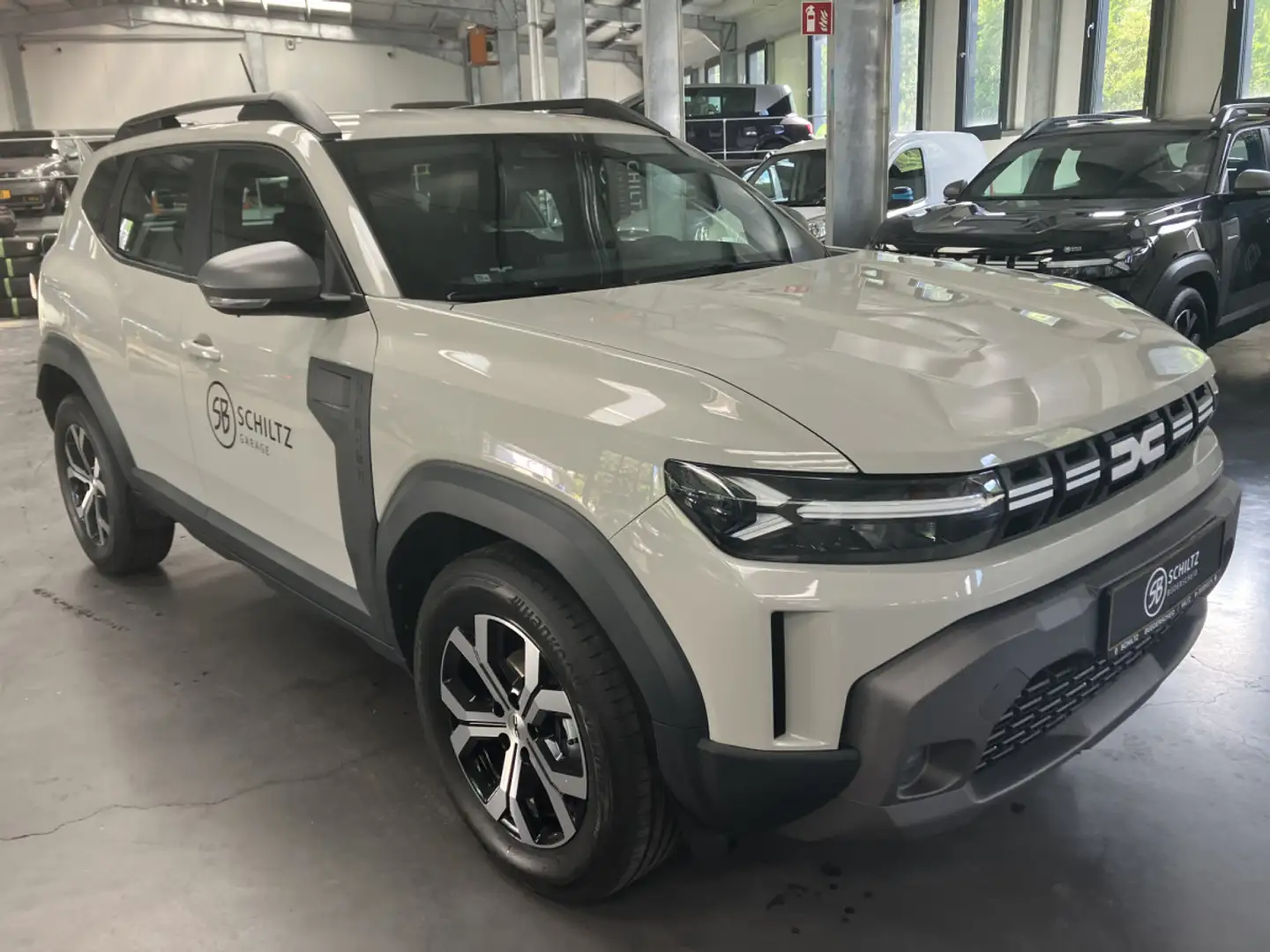 Dacia Duster 1.2 Mild Hybrid Expression Beige - 1
