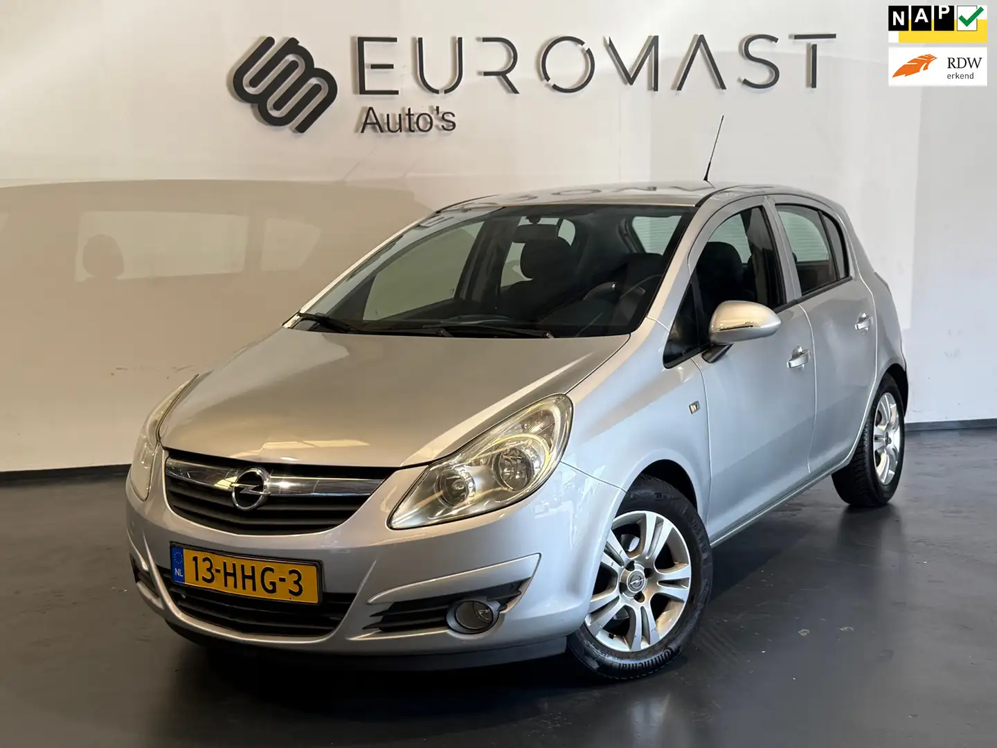 Opel Corsa 1.4-16V Enjoy Airco 5d Apk tot 30-06-2026 Grijs - 1