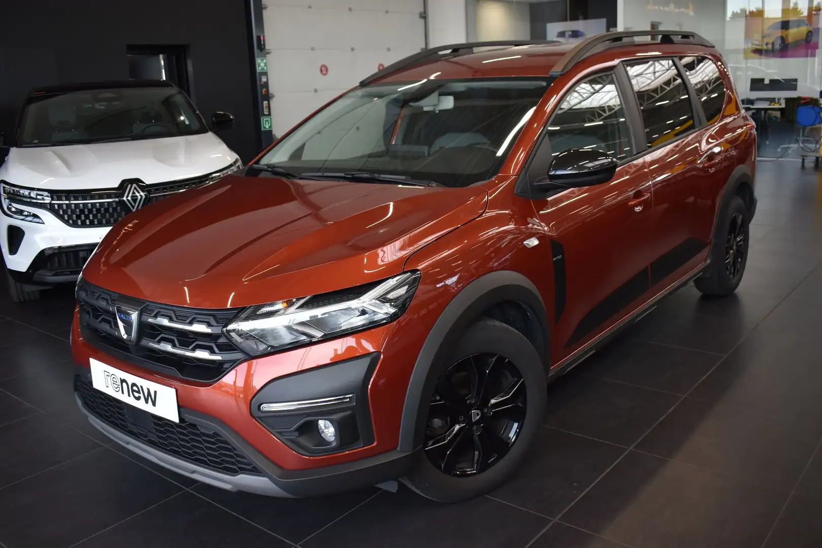 Dacia Jogger Extreme TCe 110 5pl / Valckenier Gent Portocaliu - 1