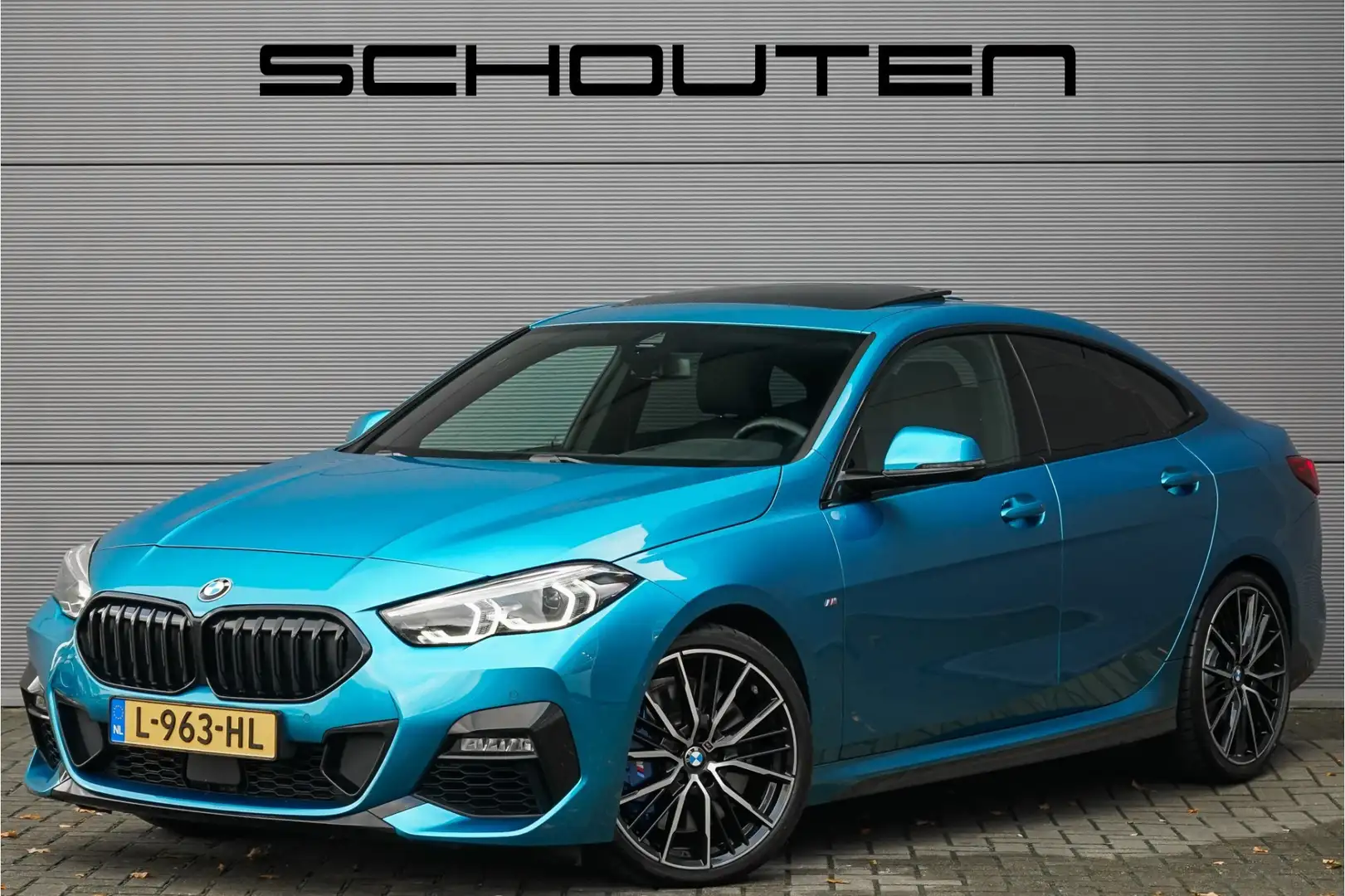 BMW 218 2-serie Gran Coupé 218i M-Sport Automaat Pano HUD Blauw - 1