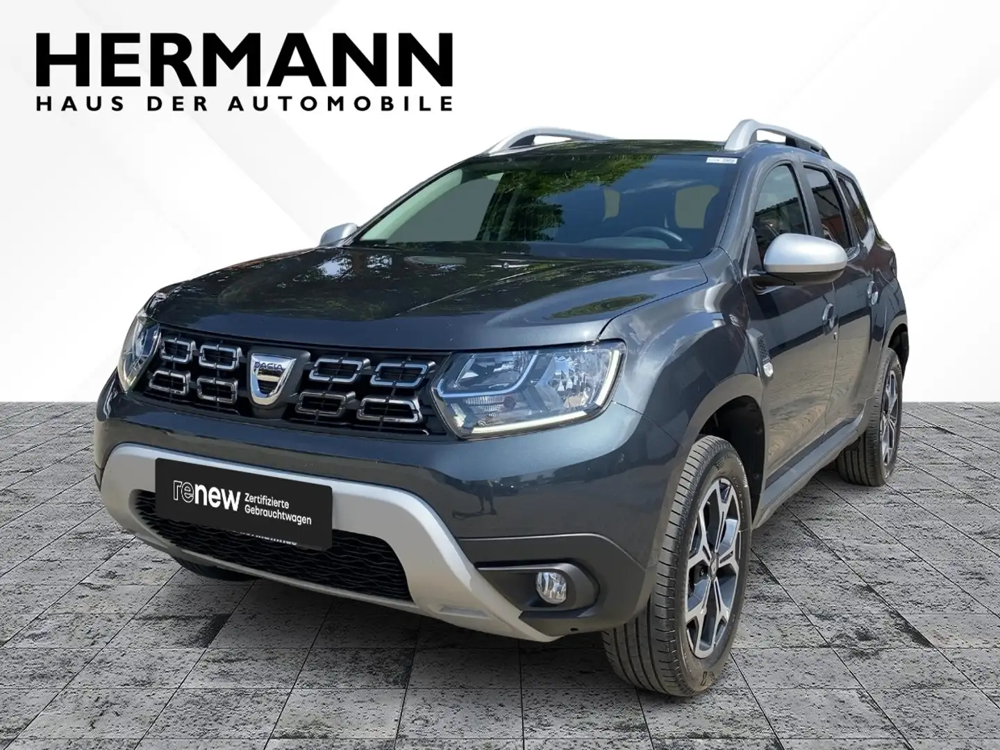 Dacia Duster 1.3 TCe 130 Prestige *Navi*Kamera*DAB* Grijs - 1