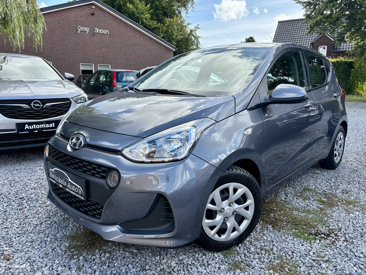 Hyundai i10 1.2i-87pk-68852km-zeer goede staat!-incl. garantie Gris - 1