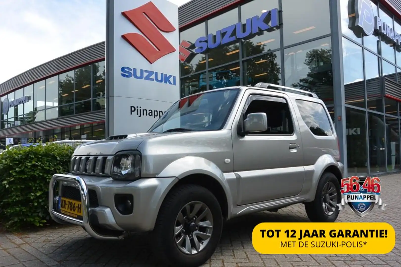 Suzuki Jimny 1.3 Exclusive 4x4 AUTOMAAT Leder/Trekhaak Gris - 1