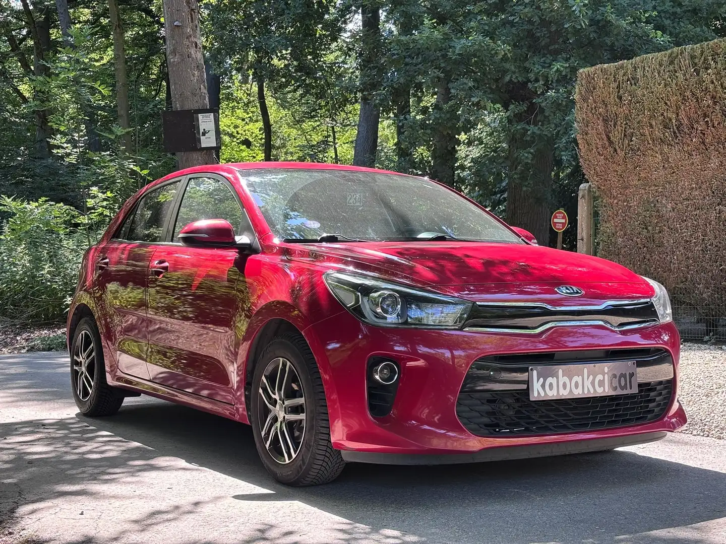 Kia Rio Rio 1.2i 84cv/A.C/GPS/CAMERA.RECUL/USB/TEL/CARNET Rouge - 1