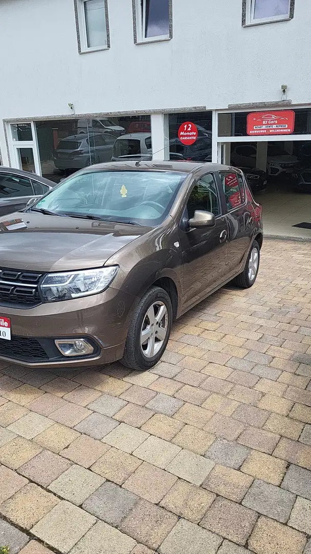 Dacia Sandero 0.9TCE 90CV*GPS*Airco*Garantie 12Mois* Bruin - 1
