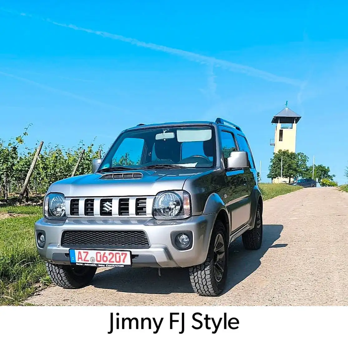 Suzuki Jimny 1.3 4WD Style 29 tkm AHK Top Zustand Silber - 1