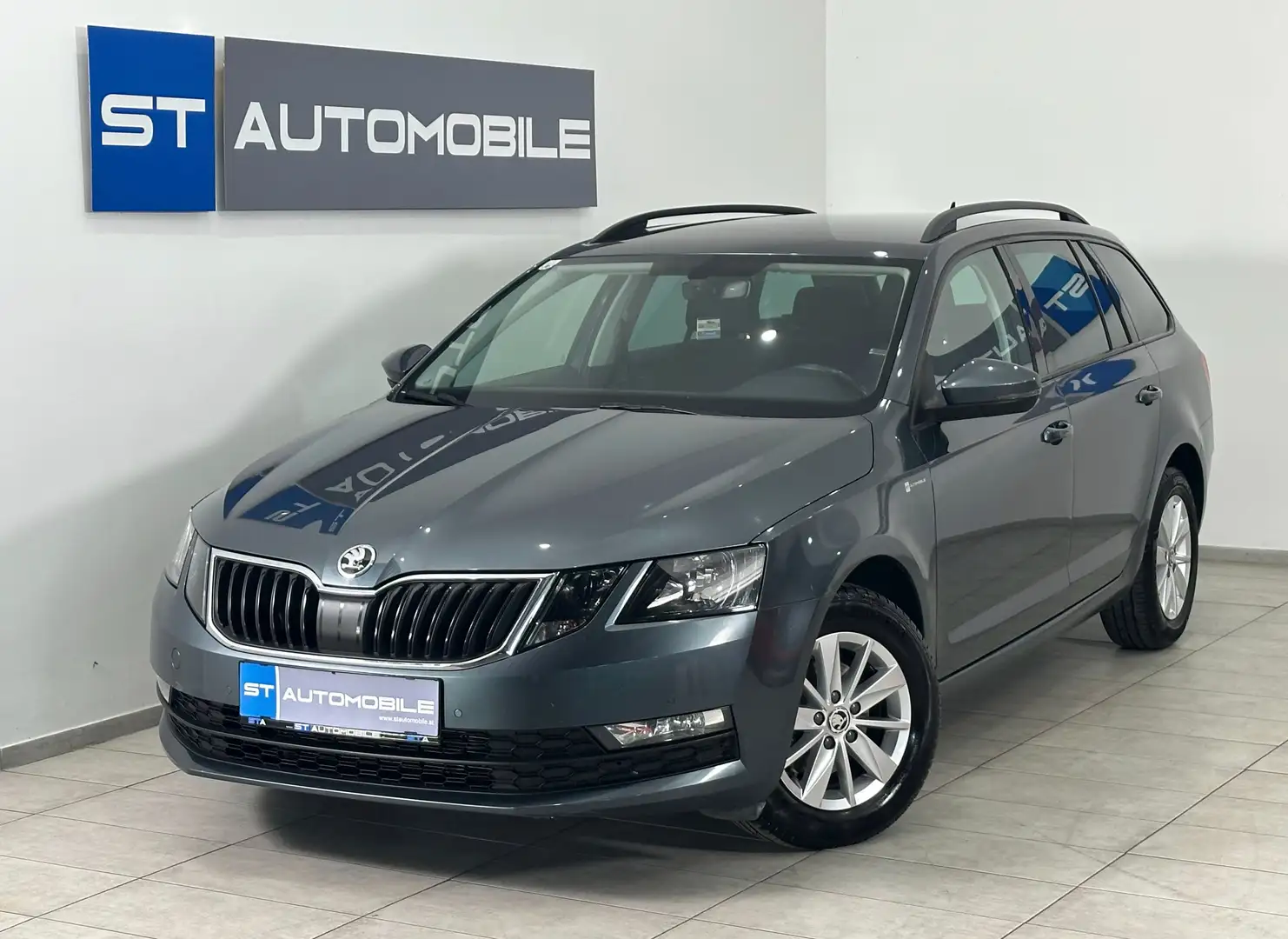 Skoda Octavia 1.6 TDI Ambition // AHK // NAVI // SHZ // Grau - 1