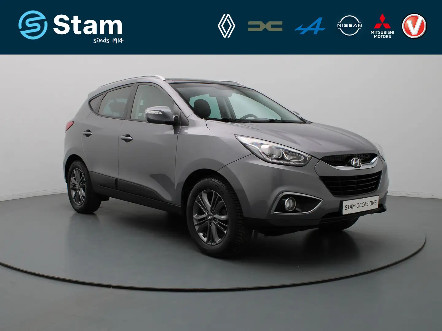Hyundai iX35 135pk GDI i-Vision Camera | Cruise | Navi | Parkee Grau - 1