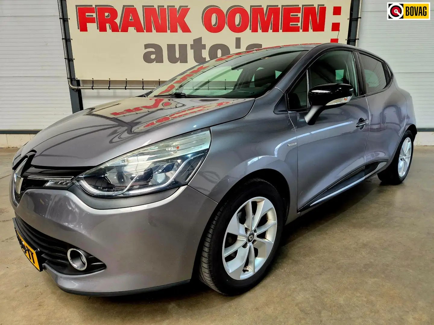 Renault Clio 1.2 73PK Limited + Navi|Bluetooth|Airco|Cruise|PDC Grijs - 1