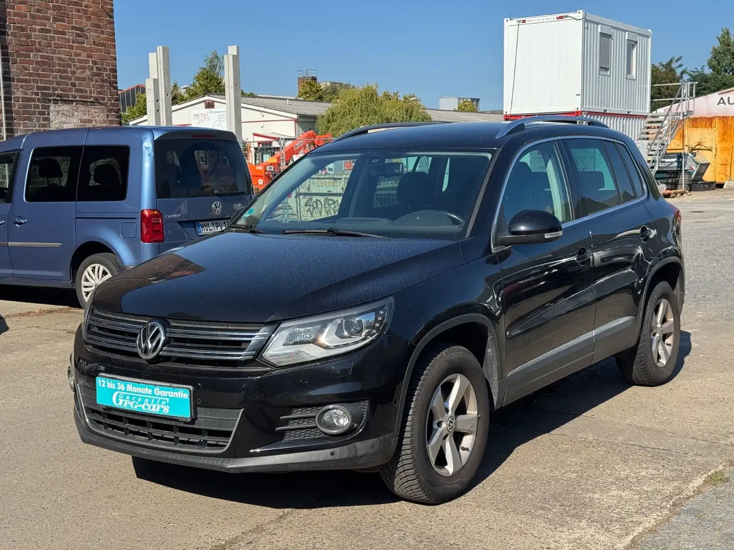 Volkswagen Tiguan Sport & Style 4Motion Scheckheftgepflegt Zwart - 1